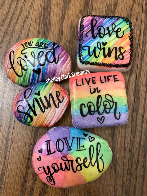 I painted these kindness rocks with watercolor and Posca pens ! Stones available now for you to paint in my stone shop https://www.etsy.com/shop/StonesByShelley Painted Santorini Stones, Pride Painted Rocks, Rainbow Painted Rocks, Pride Rocks, Rock Watercolor, Spring Rocks, Rock Sayings, Metallic Painting, Happy Stone