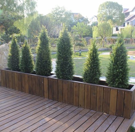 UV rated for outdoor low maintenance use. Large Potted Trees Outdoor, Tree Planters Landscape, Potted Arborvitae Patio, Outdoor Potted Trees, Artificial Landscaping Ideas, Artificial Shrubs Outdoor, Outdoor Planters With Fake Plants, Faux Trees Outdoor, Arborvitae In Pots