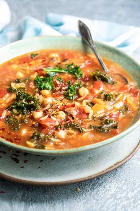 Italian Minestrone Soup is hearty yet gentle, packed full of greens, chickpeas, and vegetables in a delicious and bright tomato broth. You can customize this recipe to use up pantry staples and clean out your crisper drawer, too. Fall Meal Prep, Warming Foods, Italian Minestrone Soup, Healthy Soup Recipe, Cream Of Asparagus Soup, Creamed Asparagus, Fall Meal, Dried Porcini Mushrooms, Minestrone Soup Recipe