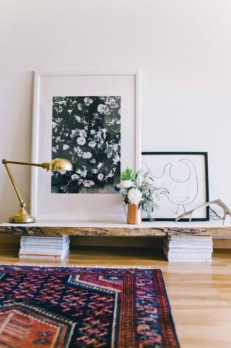 If you don’t want to lean your artwork directly on the floor, then prop it up on a stand. | 21 Cheap And Easy Decorating Tricks For Renters Wallpaper Geometric, Wit And Delight, Wallpaper Winter, Colorful Interior, Scandinavian Wall, Bathroom Top, A Rug, Low Shelves, Decoration Inspiration