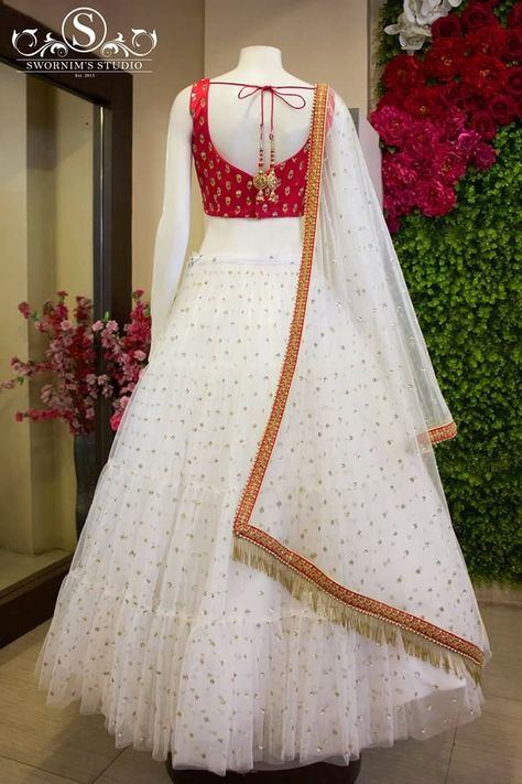 I like the back design of this top! Lehenga Saree Design, Fashion Technology, Indian Outfits Lehenga, Lehnga Dress, Designer Bridal Lehenga, Half Saree Designs, Red Lehenga, Indian Gowns Dresses, Indian Bridal Fashion