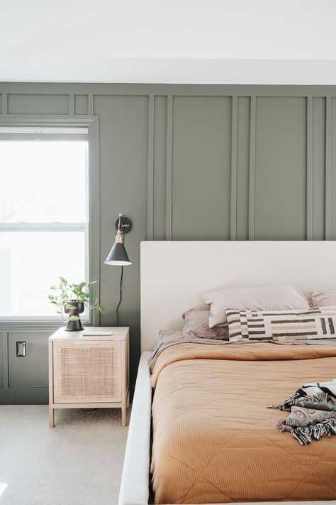 Bedroom White Paneling, Organic Modern Bedroom With Green, Statement Wall Behind Bed, Ensuite Tile Ideas, Sage Green Accent Wall Bedroom, Green Bedroom Accent Wall, White Mural Wallpaper, Traditional Modern Bedroom, Dresser Organization Ideas