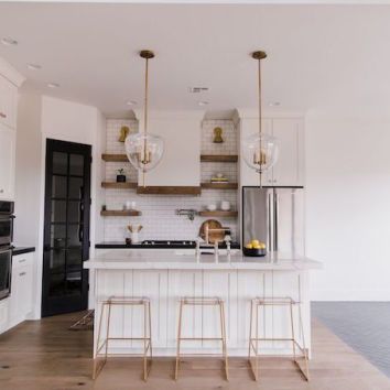 Villa Bonita Project Reveal with Fireclay Tile Ogee Drop Tile, Black Tiles Kitchen, Painted Brick Exteriors, White Fridges, Herringbone Wood Floor, Vintage Style Rugs, Open Concept Home, Handcrafted Tile, White Subway Tiles