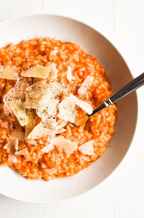 Tomato Risotto with parmesan cheese is an easy pantry friendly meal that is comforting, flavorful, and accommodates all sorts of variations. #risotto #tomatorisotto #easy #recipe #dinner #vegetarian #meatless One Banana Banana Bread, Dutch Oven Dinners, Easy Recipe Dinner, Cooking Risotto, Dinner Vegetarian, Parmesan Risotto, The View From Great Island, Tomato Risotto, Best Dutch Oven