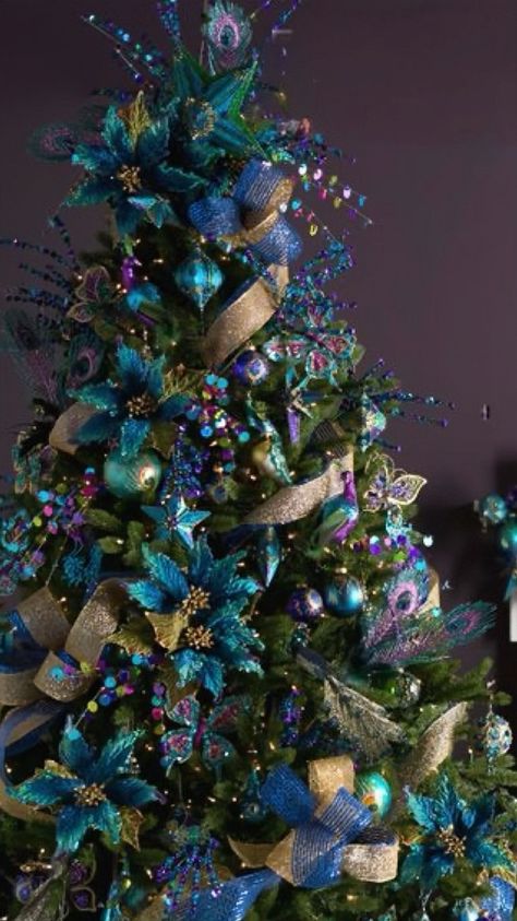 Teal Christmas Trees, Teal And Purple Christmas Tree, Peacock Color Christmas Tree, Peacock Themed Christmas Tree, Peacock Theme Christmas Tree, Peacock Tree Christmas, Gold And Teal Christmas Tree, Teal Christmas Tree Decorations, Teal Christmas Tree Ideas