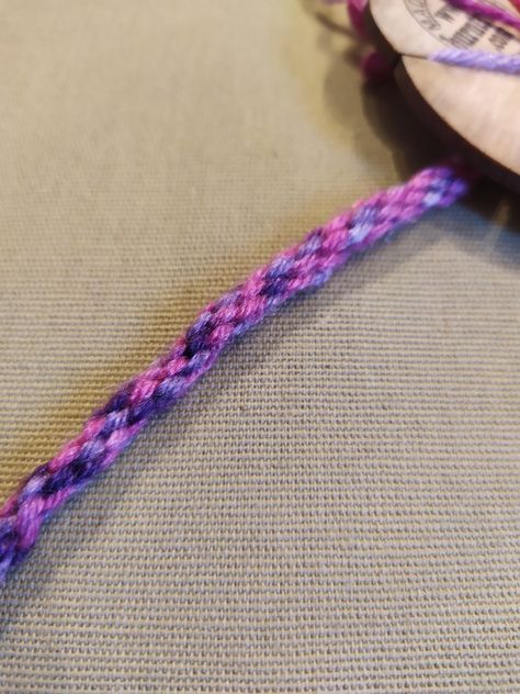 7 strand Kumihimo braiding on a burntstuff Trollen wheel – Polly Knitter Trollen Wheel, Playdate Activities, Wheel Bracelet, Kumihimo Braiding, Friendship Bracelets Easy, Yarn Braids, Yarn Stash, Tie Knots, Yarn Crafts