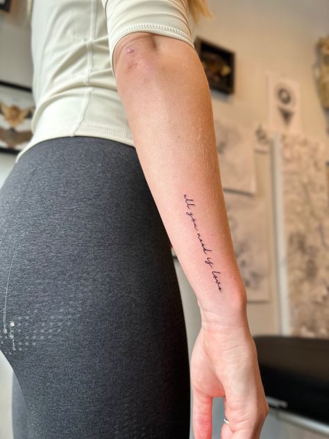 Arm Tattoos For Women Letters, Writing Down Forearm Tattoo, Side Arm Cursive Tattoo, Tattoo Placement Ideas Forearm, Arm Tattoo Placement Words, Tattoo Writing On Forearm, Script Tattoo On Forearm, Text Forearm Tattoo, Quote Wrapped Around Arm Tattoo