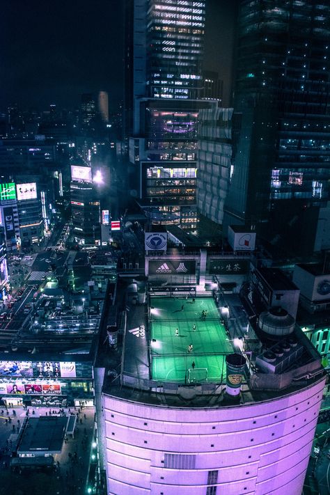 Soccer field on a rooftop in Tokyo, Japan! FuturistSpeaker.com #keynotespeaker #futuretrends #futureofwork #futurejobs Japan Soccer, Street Soccer, Tokyo Japan Travel, Random Aesthetics, City Skylines, Shibuya Tokyo, Football Pitch, Japan Aesthetic, Football Stadiums