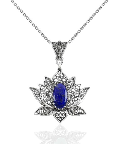 ✨ Embrace the elegance of the deep blue sea with our Lapis Lazili & Sterling Silver Lotus Pendant! 🌸 Each meticulously handcrafted charm is a symbol of serenity and wisdom, making it the perfect gift to show your love for Mom. 💙 Dive into the details of this timeless piece and find the perfect token of affection on Etsy! ➡️ Tap to shop: https://nuel.ink/kTUGko #LapisLazuliLove #LotusPendant #HandmadeJewelry #GiftForMom #CraftedWithLove #EtsyFinds #CharmNecklace #MothersDayGift #SterlingEleg... Flower Women, Lotus Pendant, Lapis Lazuli Jewelry, Lapis Lazuli Pendant, Lapis Lazuli Necklace, Lapis Lazuli Gemstone, Silver Polish, Filigree Pendant, Sterling Silver Filigree