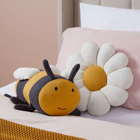 Betsy, a quality knitted cushion, infuses warmth and character, inspiring imagination and comfort. Pair it with the Little Daisy Cushion to brighten up your kid's room—this playful knitted addition adds both charm and comfort. Shop today for 30% off* cushions, throws, rugs and mirrors. #mocka #trending #style #homedeco #interiordesign #kidsroom #cuteinterior #homedecor #interior #decor #homedesign #interiors #house #homesweethome #livingroom #instahome #chic #design #furniture #dreamhome Daisy Cushion, Knitted Cushions, Shop Decor, Grand Designs, The Bee, Kids Room Design, Room Accessories, Kid Spaces, Playful Design