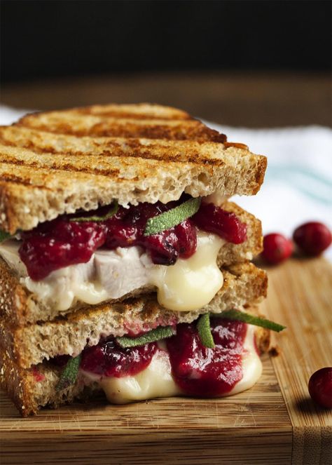 Turkey, Brie and Cranberry Mustard Panini - Once Thanksgiving is over, the question is what to do with all the leftovers. This turkey, brie, and cranberry panini provides the delicious answer. | justalittlebitofbacon.com Croissant Panini, Brie And Cranberry, Cranberry Mustard, Panini Recipe, Turkey Cranberry, Panini Recipes, Panini Sandwiches, Deli Sandwiches, Cranberry Recipes