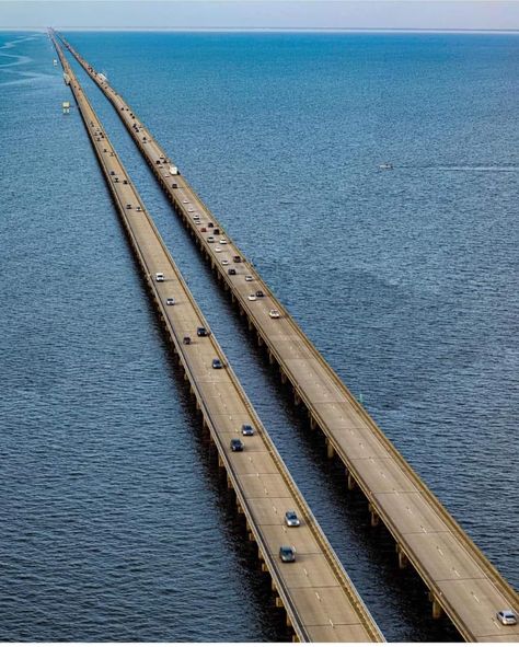 The Lake Pontchartrain Causeway in Louisiana is the longest bridge in the United States, spanning 23.79 miles across Lake Pontchartrain, it is the longest continuous bridge over water in the world. The bridge connects New Orleans with smaller communities on the north shore of Lake Pontchartrain. Lake Pontchartrain Causeway, Bridge Over Water, New Orleans Voodoo, Lake Pontchartrain, Charles Bridge, Lake Charles, North Shore, The Bridge, Louisiana