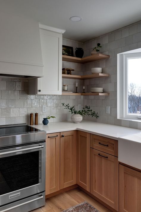 Transitional Kitchen with mix of white cabinets and white oak cabinets, open shelving, wood floors, and white back splash. Ikea Light Wood Kitchen, Natural Shaker Cabinets, White Cabinets Kitchen Wood Countertops, White Backsplash With Oak Cabinets, Mixed White And Wood Kitchen Cabinets, Wood Effect Kitchen Cabinets, Kitchen Oak Flooring, Wood Cabinets With White Backsplash, Walnut White Kitchen