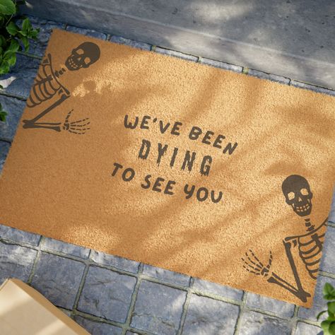 The perfect spooky door mat to complete your Halloween porch décor! DETAILS: .: One size: 24" × 16" .: Black vinyl backing .: Grade A tufted coir coconut fiber .: Adjustable shoulder straps .: Made in the USA CARE: .: Place your mat in a covered, weather-protected area such as under an overhang, awning, etc.  .: Do not expose to direct sunlight or excessive moisture.  .: Because these mats are made with natural coir fibers, there may be some initial shedding over the first month of use, it can be easily removed by occasionally shaking the mat to get rid of the loose fibers. Every item is made to order! If your item arrives and you are unsatisfied with the quality, please feel free to message me and I will do my best to respond within 24 hours. Thank you for supporting my small business! Spooky Tufted Rug, Funny Fall Doormat, Halloween Outdoor Mat, Halloween Rugs Diy, Halloween Door Mat Diy, Diy Halloween Doormat, Spooky Door, Door Mat Funny, Door Mat Diy