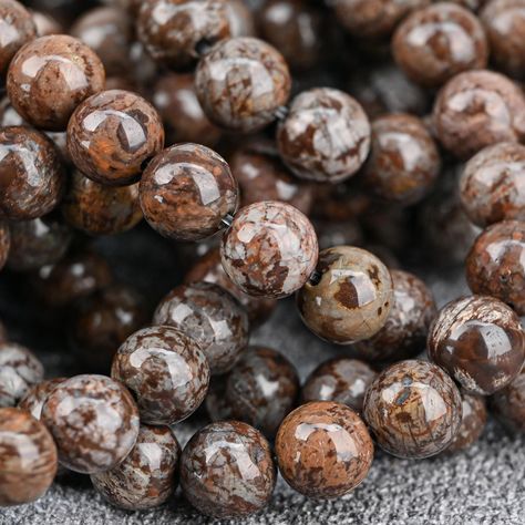 Discover the beauty of these natural Brown Coffee Jasper round beads. Available in multiple sizes (4MM, 6MM, 8MM, 10MM, 12MM), this 15.5" full strand offers smooth, polished beads perfect for jewelry making projects. These earthy tones of brown are ideal for both casual and elegant designs.  Number of beads: 4mm: 90pcs Approx/strand 6mm: 63pcs Approx/strand 8mm: 47pcs Approx/strand 10mm: 38pcs Approx/strand 12mm: 32pcs Approx/strand hole size: 1mm  These beads are crafted from genuine Brown Coff Jewelry Making Project, Brown Coffee, Elegant Designs, Natural Brown, Earthy Tones, Round Beads, Gemstone Beads, Elegant Design, Jewelry Making