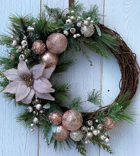 Christmas wreath for front door with rose gold and blush accents and a touch of silver sparkle. It is recommended to keep under a covered area and away from direct sunlight. Feel free to message me with any questions. Once I receive your order It will be 1-2 days to make Delivery is 1-5 days. I have chosen UPS for shipping I find them to be most reliable. When your order is shipped I will send you the tracking number and the day of delivery! Rose Gold Christmas Decorations, Pink Christmas Wreath, Vintage Pink Christmas, Christmas Wreath For Front Door, Rose Gold Christmas, Gold Christmas Decorations, Christmas Door Wreaths, Christmas Pink, Christmas Wreaths To Make