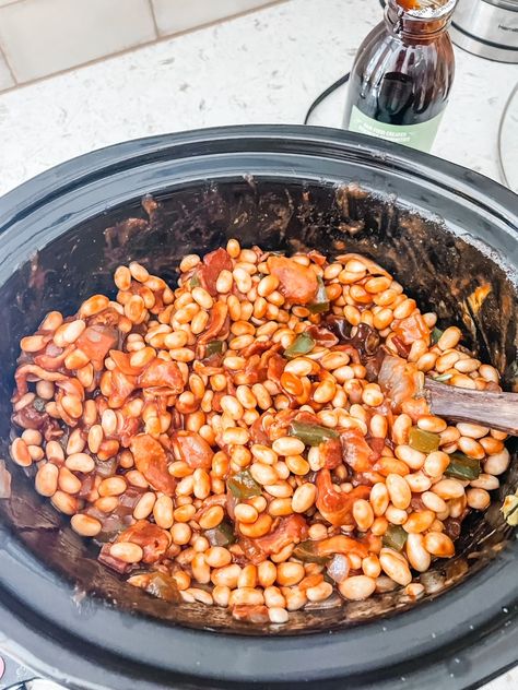 When days turn cool, my Slow Cooker Baked Beans hit the spot - with bacon, onions, and peppers in a sauce of tomato, molasses, and mustard. Crock Pot Baked Beans, Holiday Potluck Recipes, Baked Beans From Scratch, Baked Beans Crock Pot, Holiday Potluck, Slow Cooker Baked Beans, Slow Cooker Beans, Slow Cooker Baking, Beans Recipes