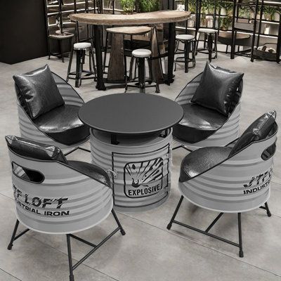 Products include: table *1 and chairs*2 17 Stories Pieces Included: 5 | 17 Stories Marshonda Round 27.6" Dining Set black / brown / gray / whiteMetal | 4 | Wayfair Oil Drum Table, Drum Chair, Diy Stool, Welded Furniture, Metal Barrel, Barrel Furniture, Oil Drum, Metal Furniture Design, Drum Table