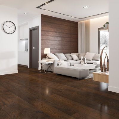 Harmony Collection is an engineered rigid core hardwood flooring product and the newest trend in wood floors. Its unique construction features a 1.2mm real wood veneer that is completely waterproof and coated with our signature Aluminer UV-cured aluminum oxide finish. Designed in wide-width, random length planks to create an unparalleled design in any atmosphere. Selkirk Color: Dark Brown | Selkirk Harmony 7" x 74.8" x 6.4mm Vinyl Plank 0.25 H x 7.0 W x 74.8 D in brown in Dark Brown | 7" W X 74. Dark Wood Vinyl Plank Flooring, Tiles That Look Like Wood Floors, Espresso Wood Floors Living Rooms, Kitchen With Light Wood Cabinets And Dark Floors, Dark Walnut Floors Living Room Decor, Brown Vinyl Flooring Living Room, Dark Brown Wood Floors Living Room Decor, Dark Brown Vinyl Flooring, Walnut Flooring Bedroom