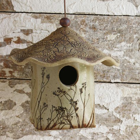 Slab built bird house I made a long time ago. I've sold a lot of these but never kept any for myself. Might have to make a few more. #gardening #birdhouses #birdhouseideas #slabbuilt #slabbuiltceramics #ceramics #design #decoration #floraldecoration #style #gardenlove #art #colleenhuth #colleendeissdesigns Bird House Feeder, Ceramic Birdhouse, Clay Bird, Bird House Kits, Bird Aviary, Diy Bird Feeder, Decorative Bird Houses, Garden Pottery, Slab Pottery