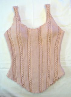 This corset style top was named for Isambard Kingdom Brunel, an English engineer best known for his innovative solutions to long-standing engineering problems which revolutionized public transport and modern engineering. After all, what greater feat of engineering is there than a Victorian corset? Knit it in a pastel color and use a ribbon for a soft romantic or even a sexy boudoir look or try a dark color and a leather thong for a steampunk or pirate look. Isambard can be worn over a blouse...