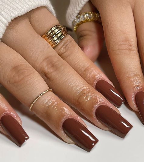 For a simple yet trendy look, these nails are painted in a rich chocolate brown. The medium length nails are perfect for those who want a sophisticated and elegant look for autumn. The glossy finish adds a touch of luxury to this minimalist design. Brown French Tips Square, Brown French Tip Nails Square, Square Brown Nails, Fall Nails Square, Medium Length Nails, Length Nails, French Tip Gel Nails, Fall Nail Inspo, Autumn Skin