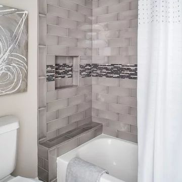 Gray Tile Shower Ideas With Tub, Vertical Subway Tile Tub Surround, Undermount Tub Shower Combo, Bathroom Remodel Tub Shower Combo Tile, Low Profile Tub Shower Combo, Tub Shower Tile Ideas Bathtubs, Bathtub Shower Combo Tile Ideas, Tub Shower Combo Tile Ideas, Modern Shower Tub Combo