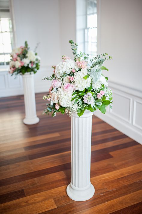 Floral Arrangements on column pedestals! Flowers Pedestal Wedding, Flower Arrangements On Pedestals, Wedding Columns Decor, Christmas Floral Arrangements Diy, Sanctuary Decor, Wedding Columns, Columns Decor, Column Decoration, Wedding Decor Vases