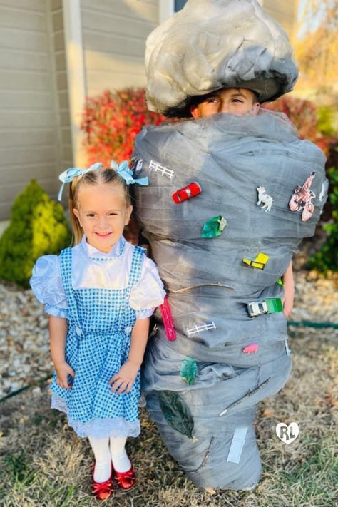 A little girl is dressed up like Dorothy from Wizard of Oz, and her older brother standing next to her is dressed up like a tornado. Tornado Costume Kids, Tornado Costume, Sibling Halloween Costumes, Sibling Costume, Diy Halloween Costume, Matching Halloween, Halloween 2024, Diy Halloween Costumes, Diy Costumes