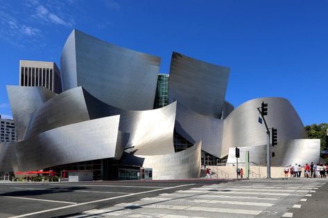 Buildings That Show the Beauty of Deconstructed Architecture | Architectural Digest Deconstructed Architecture, Peter Eisenman, Deconstructivism, Daniel Libeskind, Walt Disney Concert Hall, Vitra Design Museum, Rem Koolhaas, Jean Nouvel, Vitra Design