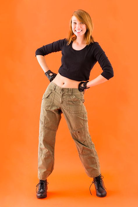 Grab your cargo pants + combat boots to turn into Kim Possible this Halloween. Cargo Pants Halloween Costume, Ginger Spice Costume, Pants Halloween Costume, Kim Possible Costume, Red Head Halloween Costumes, Redhead Costume, 90s Halloween Costumes, Teen Halloween, Cheap Halloween Costumes