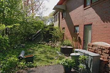 side-yard-39962896 Small Garden Before And After, Overgrown Backyard Makeover, Landscaping Before And After, Overgrown Backyard, Overgrown Yard, Garden Renovation Ideas, Outside Planters, Property Maintenance, Small Water Features