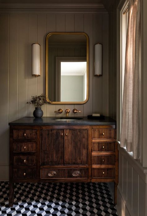 Black Counters Bathroom, Anthropology Bathroom, Moody Earthy Interior Design, Black Rustic Bathroom, Dark Vanity Bathroom Ideas, Hardwood Bathroom, Moody Cottage, Heidi Caillier, Moody Bathroom