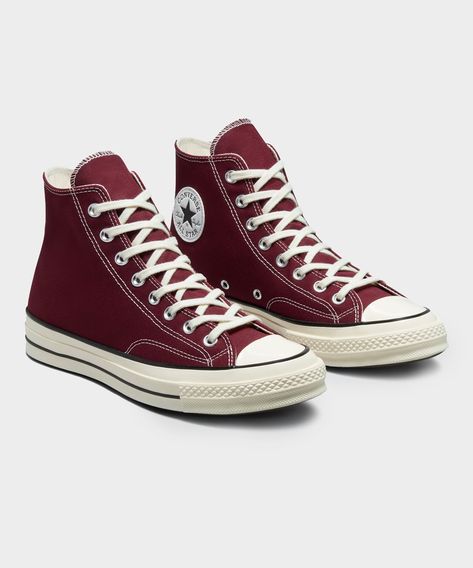 Converse has updated the premium Chuck 70 with durable 12oz vintage canvas in a new Warm Burgundy red. The Chuck 70 mixes the best details from the ’70s-era Chuck with impeccable craftsmanship and premium materials. An elevated style icon, it features lightweight cushioning to keep you looking—and feeling—good all day. Crafted in a recycled poly-canvas for an elevated feel. Premium cushioning provides all-day comfort and support. New Converse colors to refresh your rotation. Shiny, taller rubber Converse Colors, Burgundy Converse, Marauders Dr, Mcu Dr, Random Clothes, Red Converse, 70s Era, New Converse, Elevated Style