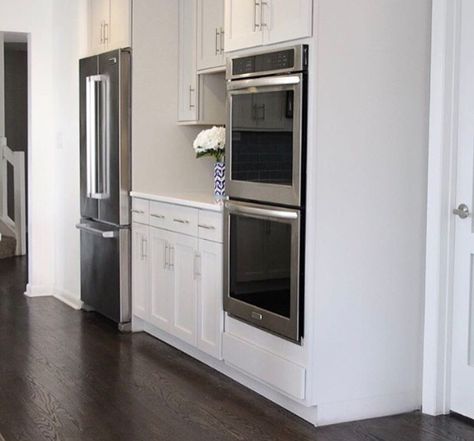 Dark Hardwood Floors Kitchen, Neutral Kitchen Colors, Dark Kitchen Floors, Dark Hardwood Floors, Appliance Storage, Espresso Kitchen Cabinets, Kitchen Dark, Espresso Kitchen, Gray And White Kitchen