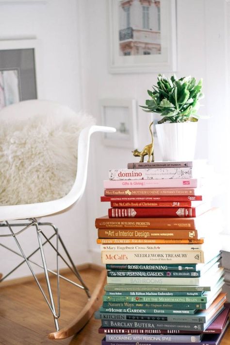 rainbow book stack table Stacked Books On Floor, Book Stack Side Table, Stacking Books On The Floor, Books Stacked On Floor Aesthetic, Books On Floor Aesthetic, Books Stacked On Floor, Stacked Books Aesthetic, Books On Floor, Floor To Ceiling Gallery Wall