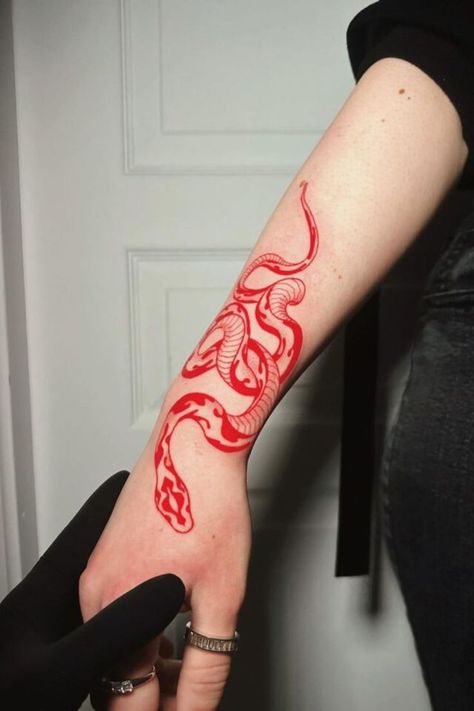 "Check out these stunning tattoo ideas with 12 Red Tattoo Ideas that showcase the power of red in body art. Perfect for anyone who loves bold, vivid designs!" Black And Red Sleeve Tattoo, Red Shoulder Tattoo, Black And Red Tattoo Design, Red Tattoo Men, Red String Tattoo, Joker Card Tattoo, Red Tattoo Ideas, Red Tattoo, Elbow Tattoos