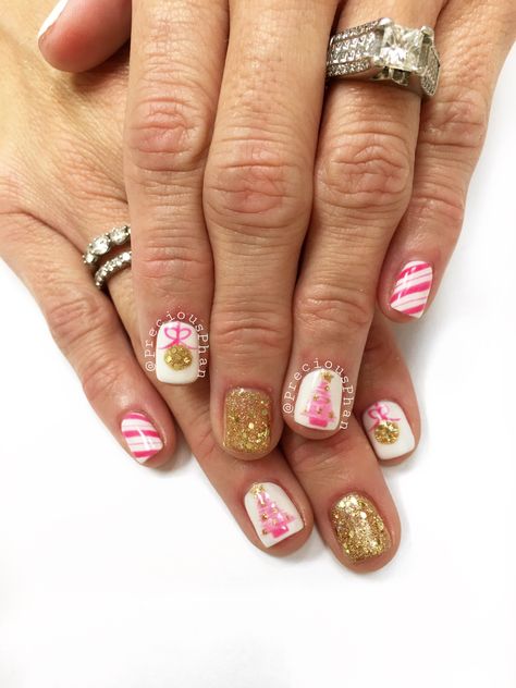 Pink and gold nails. Christmas tree. Candy cane and ornament nails. Christmas nails. #PreciousPhan Pink And Red Nails Christmas, Pink Christmas Tree Nails, Pink And Gold Christmas Nails, Nutcracker Nails Designs, Nails Christmas Pink, Pink Candy Cane Nails, Hot Pink Christmas Nails, Pink Nails Christmas, Trendy Nails Christmas