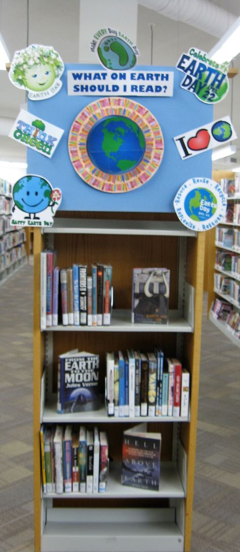 A fun Earth Day library book display titled 'What on Earth should I read next?' Earth Day Library Activities, April Book Displays, Earth Day Library Display, April Library Displays, Earth Day Display, Library Job, Dvd Display, Book Bulletin Board, Holiday Boards