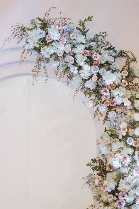 A beautiful floral arch with pastel blue, white and pink roses to beautify the wedding backdrop. Pastel Flowers Backdrop, Pastel Blue Engagement Decor, Blue Pink White Wedding Theme, Nikkah Board, Teal Blue Decor, Blue Bridal Shower Themes, Wedding Themes Ideas, Engagement Backdrop, Simple Stage Decorations