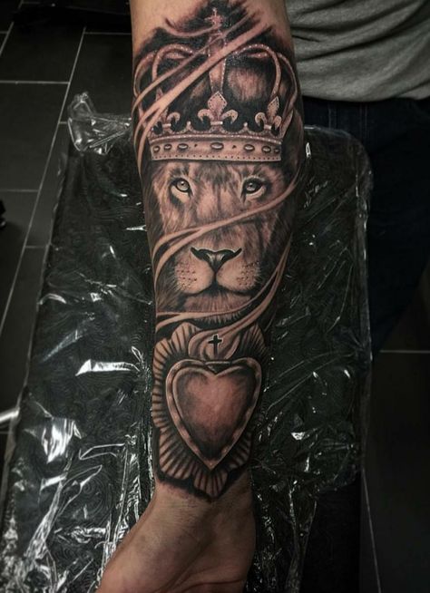 Lion wearing Crown and Sacred Heart by Angel at Puzzle Piece Tattoo San Francisco CA #tattoos #tattoo #beauty Heart Of A Lion Tattoo, Lion Heart Tattoo, Lion Wearing Crown, Religious Tattoo Sleeves, Hart Tattoo, Puzzle Piece Tattoo, Heart Of A Lion, Piece Tattoo, Trending Tattoos