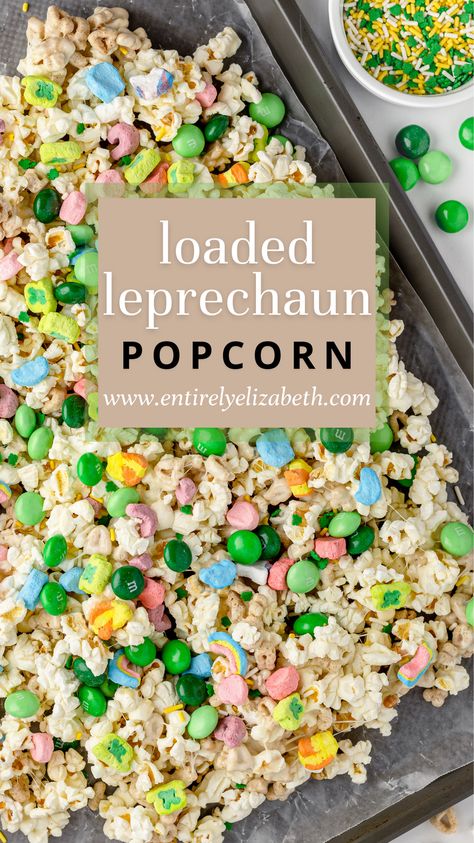 This loaded popcorn was made for St. Patrick’s Day! It is perfect for bating those pesky Leprechauns! With flavors of popcorn, marshmallow, mint M&Ms, and lucky charms, you will quickly become addicted to this one! Lucky Charms Trail Mix St Pattys, Lucky Charms Popcorn, St Patties Day Treats, Lucky Charm Marshmallow Recipes, Lucky Charms Snacks, Lucky Charm Bars, Leprechaun Snack Mix Recipe, St Patty’s Day Treats, St Patrick’s Treats For Kids