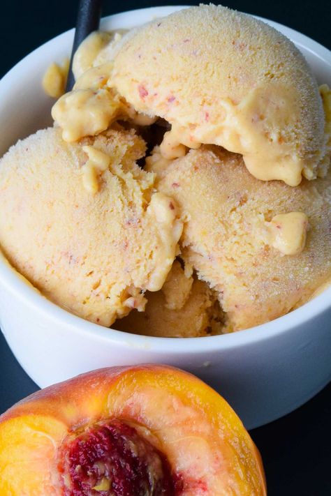 Easy Peach Sherbert--Fresh Georgia peaches and sweetened, condensed milk easily combine in a blender to make this refreshing and easy peach sherbert! A healthy, vibrant dessert for summer! {cutsandcrumbles.com} #peaches #sherbert #sherbet #dessert #freshdessert #summerdessert #kidfriendlyfruit #summerdessert #easydessert #cutsandcrumbles Peach Sherbet Recipe, Peach Frozen Yogurt, Homemade Peach Ice Cream, Sherbet Recipes, Peach Bread, Peach Ice Cream, Peach Sorbet, Peach Recipe, Homemade Ice