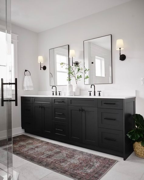 I’m so thrilled with how this primary bathroom design came to fruition as part of this new build in Queen Anne. It was a major project (in so many ways) and the result is remarkable. The bathroom layout was originally quite tricky when we were working with the plans. We wanted to maximize the natural light, and getting the window size and placement were critical decisions. Once we solidified the layout and the window, we worked to ensure that the sconces and overhead lighting provided the r... Primary Bathroom Design, Matte Black Fixtures, Black Cabinets Bathroom, Chantilly Lace Trim, Black Fixtures, Black Vanity Bathroom, Window Size, Bathroom Stuff, Black Vanity