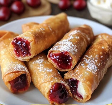 Pennsylvania's Cherry Cheesecake Egg Rolls: A Fusion of Flavors - NewsBreak Lemon Creme Cake, Fried Cheese Bites, Funnel Cake Bites, Creamy Broccoli Cheddar Soup, Apple Slice Recipe, Egg Roll Ingredients, Caramel Dessert Recipes, Classic Fall Desserts, Easy Strawberry Jam