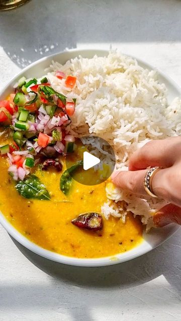 Rafia Mazhar on Instagram: "HERE'S HOW TO MAKE IT ⤵️ ⠀⠀⠀⠀⠀⠀⠀⠀⠀ Yellow Daal Chawal 🍛  Recipe Daal ¾ cup yellow daal ½ cup orange daal 1 small onion chopped 1 tomato chopped 1 tbsp ginger garlic paste 1 tsp salt  1 tsp red chilli powder  ¾ tsp turmeric  Baghar ⅓ to ½ cup desi ghee or oil  1 tsp cumin seeds Few red button chillies ½ tsp coriander seeds ½ tsp mustard seeds Few curry leaves  3 garlic cloves sliced  Handful chopped coriander  • Wash the daal well & drain the water • Add in a pot with about 2½ cups of fresh water • Add all the remaining ingredients & mix well • Pressure cook for 5 minutes. Or cook on stove until the daal is cooked well and softened  • Cook until desired consistency • In a small pan heat the ghee/oil. Add all the baghar ingredients except the curry leaves. Cook t Daal Chawal Recipe, Daal Chawal, Chawal Recipe, Ginger Garlic Paste, Red Chilli Powder, Cumin Seeds, Mustard Seeds, Garlic Paste, Coriander Seeds