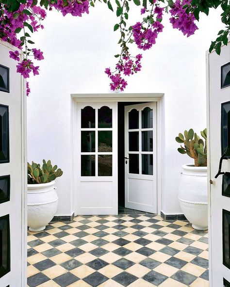 Black And White Courtyard, Moroccan Sunroom, Outdoor Hallway, Summer Interior Design, Moroccan Summer, Summer Interior, Central Courtyard, Exterior Tiles, Checkerboard Floor