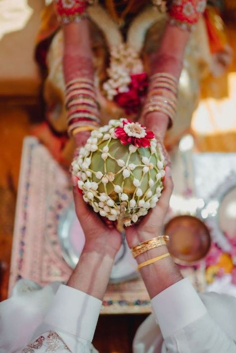 #KobbariBondam or the decorated coconut is an auspicious and integral part of #southIndianweddings. Since its so auspicious, therefore much attention is paid to make it stand out through different #decorationideas. Here are a few of them….

#Threads Bride Coconut Decoration, Thread Ceremony, Bangalore Wedding, Coconut Decoration, Ceremony Decorations Outdoor, Poola Jada, Wedding Gift Art, Gifts Packing, Kobbari Bondam