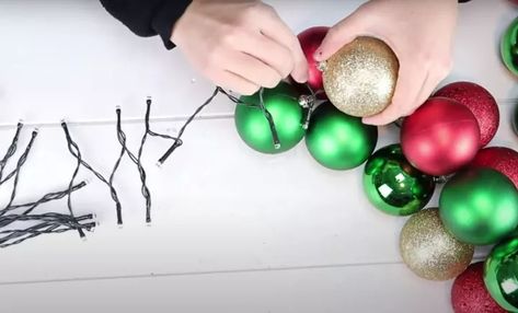 Ornament Garland DIY | Hometalk Diy Ornament Garland, Ornament Garland Diy, Christmas Ball Ornaments Diy, Diy Christmas Ball, Outdoor Garland, How To Make Garland, Christmas Lights Garland, Dollar Store Christmas Crafts, Diy Christmas Garland