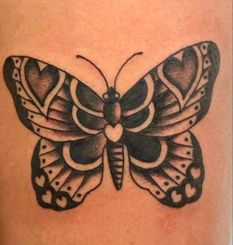 Traditional butterfly witb hearts. Work done by @tattoopaulski on instagram. American Trad Butterfly Tattoo, Butterfly With Hearts Tattoo, Butterfly American Traditional Tattoo, Folk Butterfly Tattoo, American Traditional Butterfly Tattoo Black, Traditional Style Butterfly Tattoo, Butterfly With Heart Tattoo, Trad Butterfly Tattoo, Heart And Butterfly Tattoo